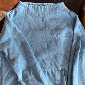 Size M baby blue gym shark sweater shirt only worn a handful of times.